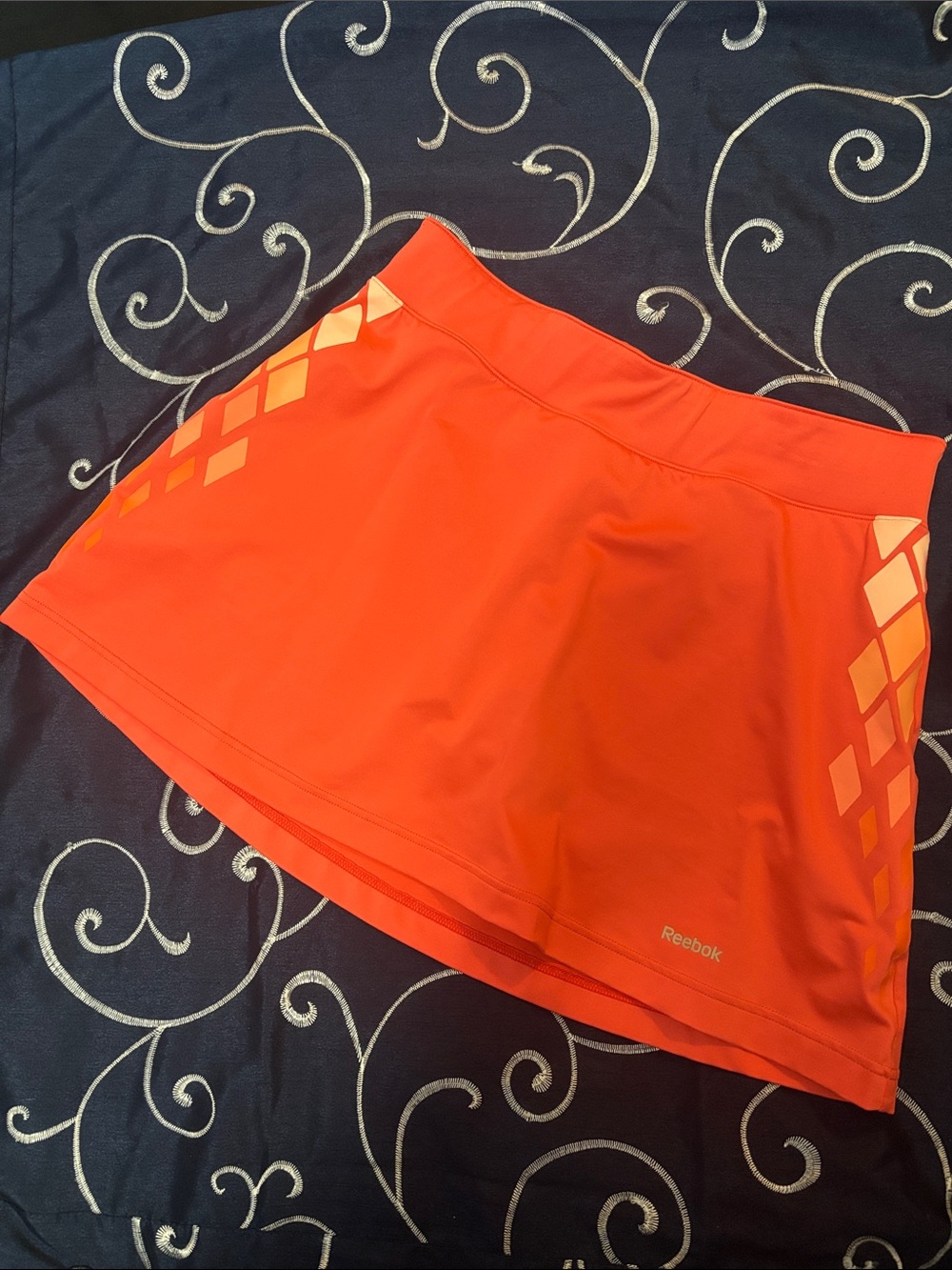 Reebok Women’s Bright Orange Athletic Tennis, Golf Skort with Diamond Accent
